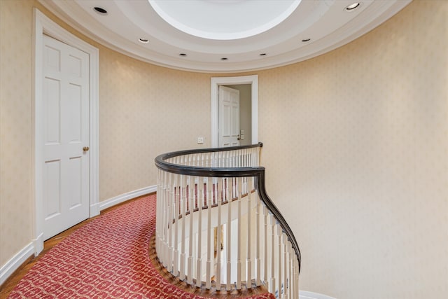 hallway with hardwood / wood-style floors