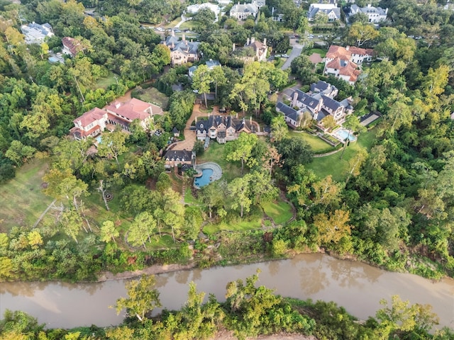 birds eye view of property featuring a water view and a residential view