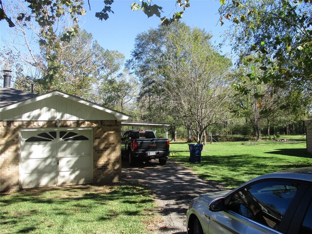 319 River Rd, Goodrich, TX 77335 - view of side of property with brick siding and a yard