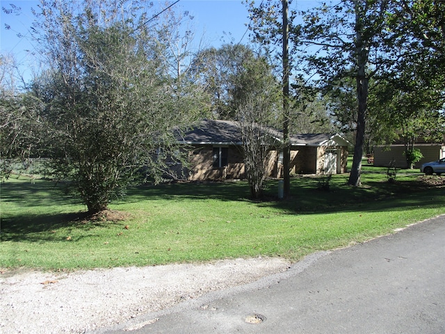 view of front of home with a front lawn