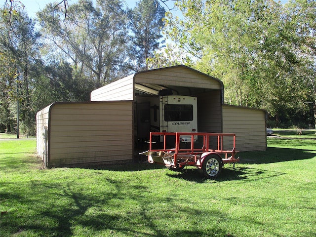 view of outdoor structure featuring a lawn