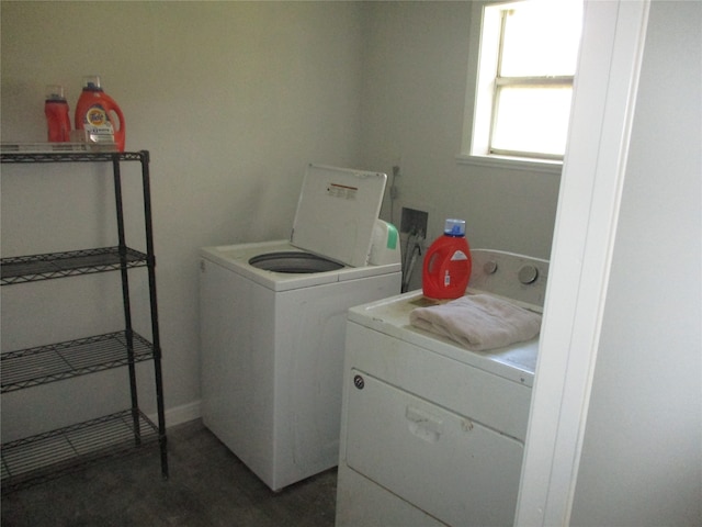 washroom featuring washing machine and dryer