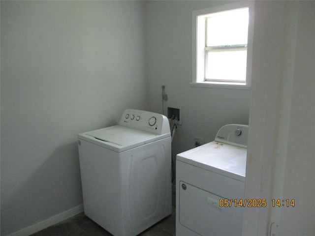 319 River Rd, Goodrich, TX 77335 - laundry room featuring independent washer and dryer and baseboards