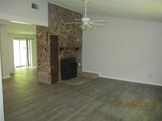 319 River Rd, Goodrich, TX 77335 - unfurnished living room with a ceiling fan, a stone fireplace, baseboards, wood finished floors, and crown molding