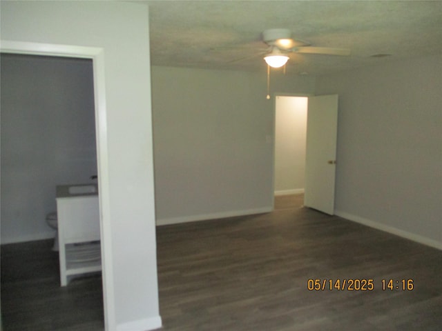 319 River Rd, Goodrich, TX 77335 - empty room featuring ceiling fan, wood finished floors, and baseboards