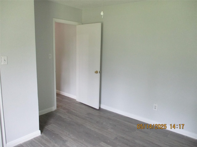 319 River Rd, Goodrich, TX 77335 - unfurnished room featuring wood finished floors and baseboards