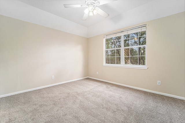 carpeted empty room featuring ceiling fan