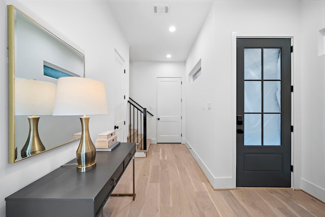 entrance foyer featuring light hardwood / wood-style floors