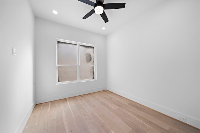 empty room with light wood-type flooring and ceiling fan