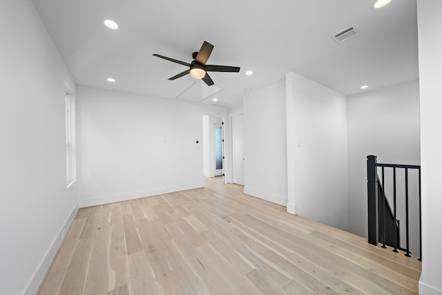 unfurnished room featuring ceiling fan and light hardwood / wood-style flooring