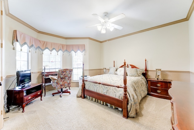 bedroom with ceiling fan, carpet floors, and ornamental molding