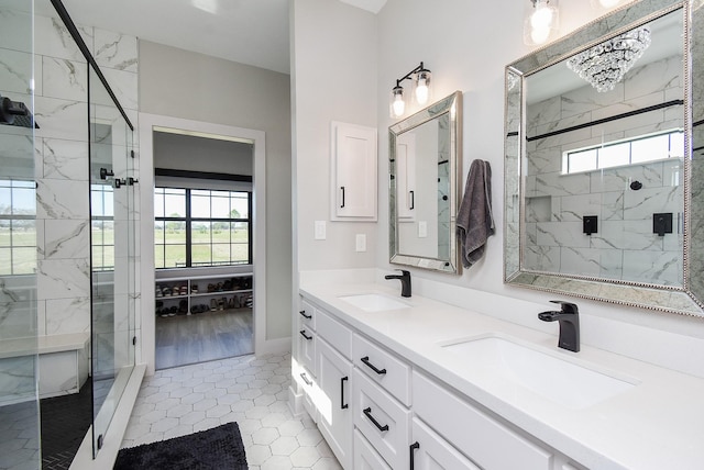 15007 Barak Rd Unit P, Guy, TX 77444 - bathroom with plenty of natural light, a marble finish shower, and double vanity