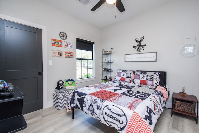 bedroom featuring ceiling fan and light wood-type flooring