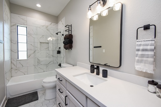 full bathroom featuring tile patterned floors, vanity, toilet, and tiled shower / bath