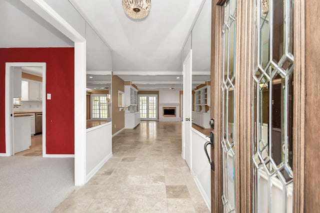 view of carpeted foyer