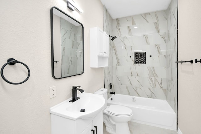 full bathroom featuring toilet, vanity, and tiled shower / bath