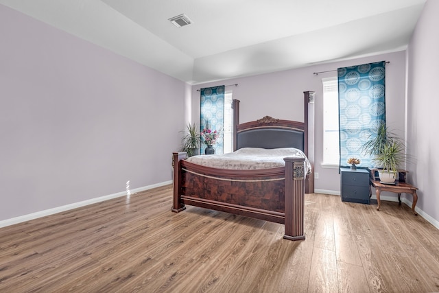 bedroom featuring light wood-type flooring