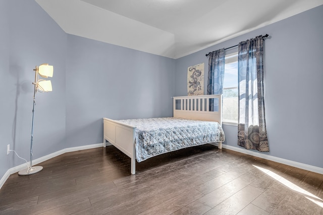 bedroom featuring dark hardwood / wood-style floors