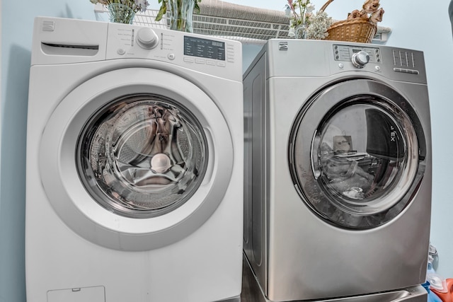 washroom featuring separate washer and dryer