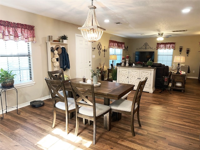 dining room with hardwood / wood-style flooring and plenty of natural light