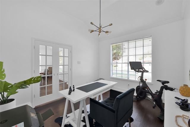 office with lofted ceiling, an inviting chandelier, french doors, ornamental molding, and dark hardwood / wood-style flooring