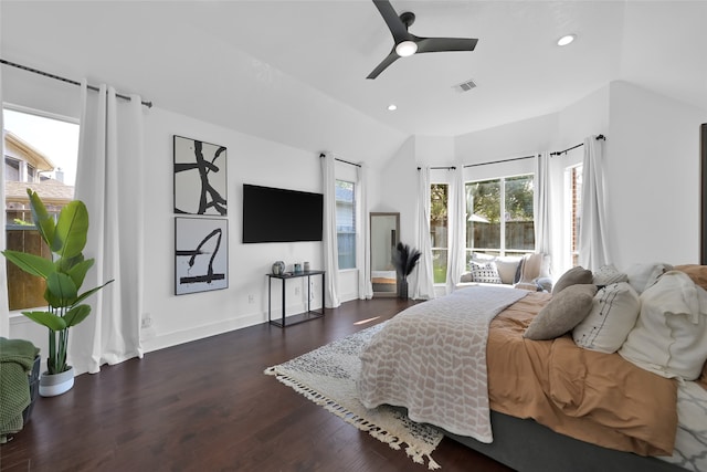 bedroom with vaulted ceiling, ceiling fan, and dark wood-type flooring