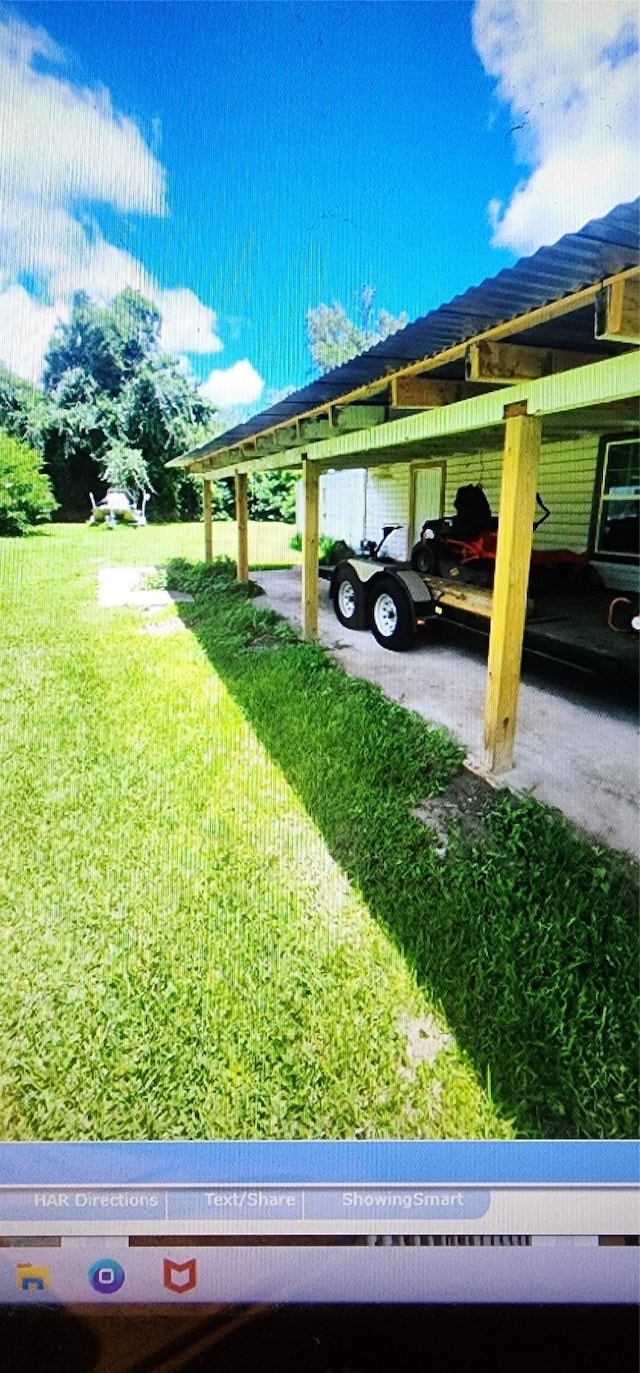 exterior space with a carport