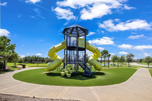 view of playground featuring a yard