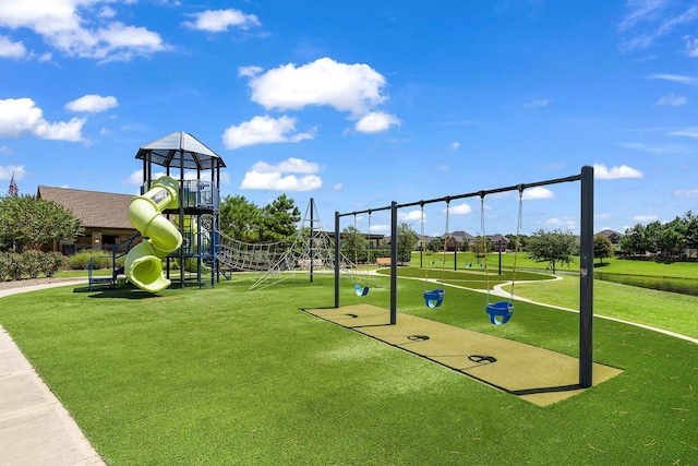 view of jungle gym featuring a lawn