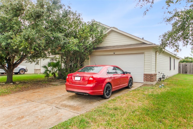 garage with a yard