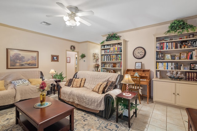 living room featuring ceiling fan, light tile patterned floors, and ornamental molding