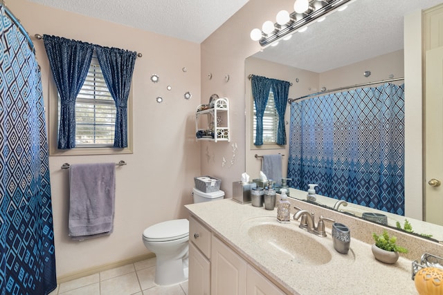 bathroom featuring a shower with curtain, tile patterned flooring, a textured ceiling, toilet, and vanity