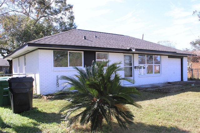 back of house featuring a yard