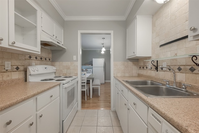 kitchen featuring ornamental molding, white appliances, sink, white cabinets, and hanging light fixtures