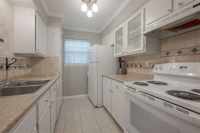 kitchen with tasteful backsplash, white cabinetry, sink, and white appliances