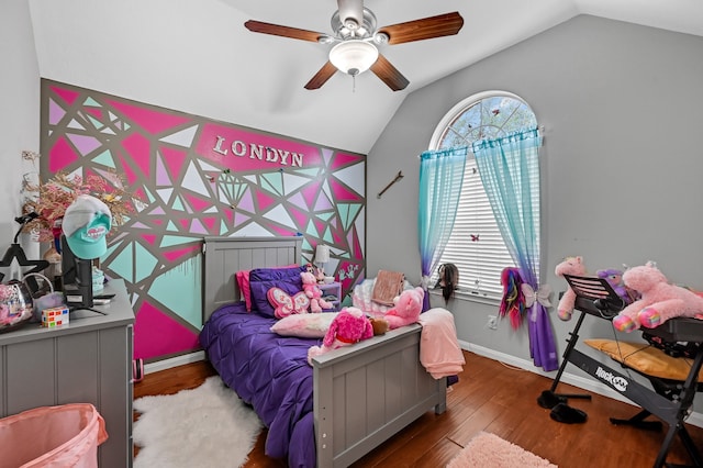 bedroom with ceiling fan, wood-type flooring, and lofted ceiling