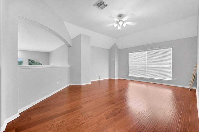 unfurnished living room with hardwood / wood-style floors, ceiling fan, and lofted ceiling