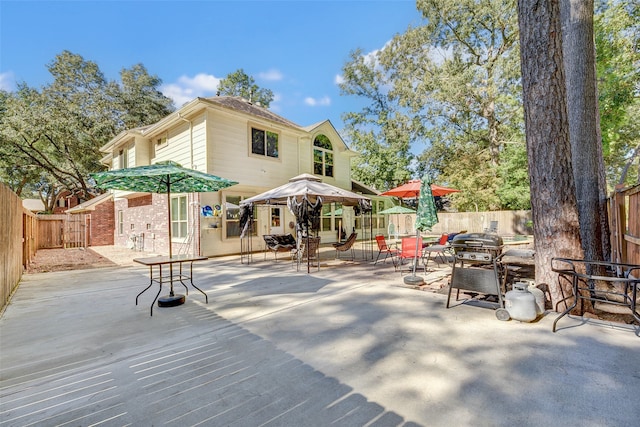 rear view of house featuring a patio