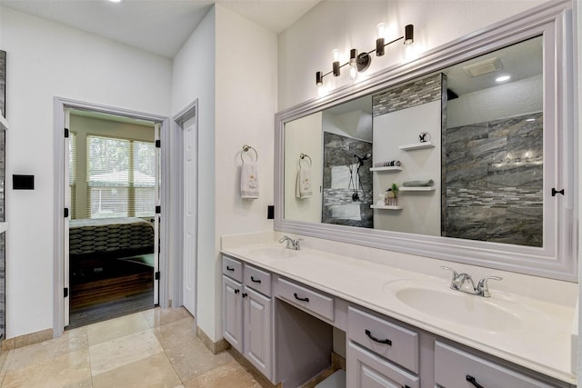 31202 Deerwood Park Ln, Spring City, TX 77386 - full bath featuring ensuite bathroom, double vanity, a shower, and baseboards