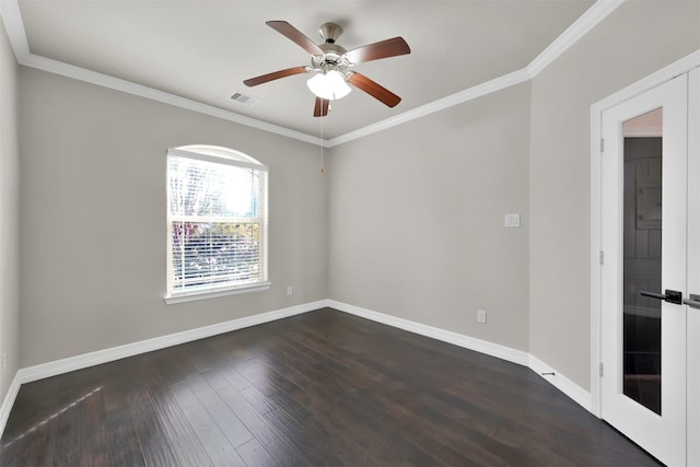 empty room with ceiling fan, french doors, crown molding, and dark hardwood / wood-style floors