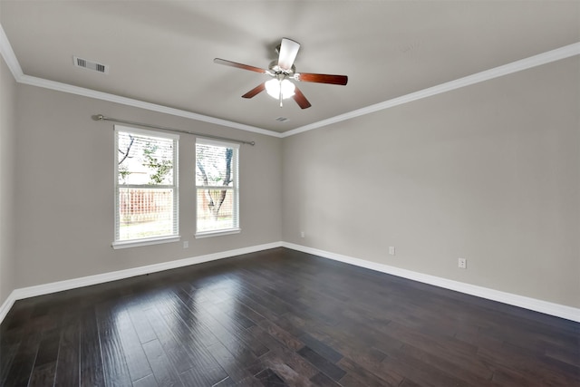 unfurnished room featuring ornamental molding, ceiling fan, and dark wood-type flooring