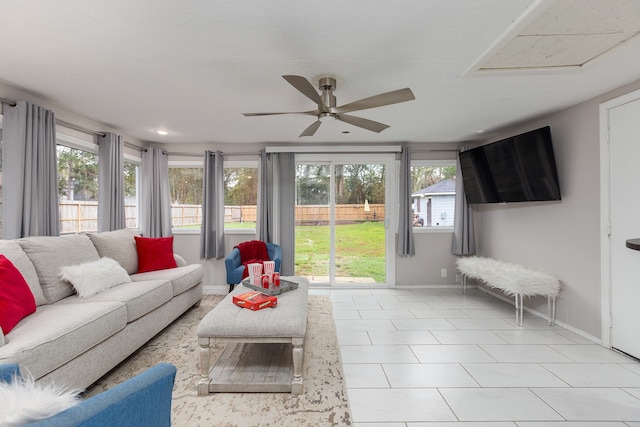 sunroom / solarium with ceiling fan