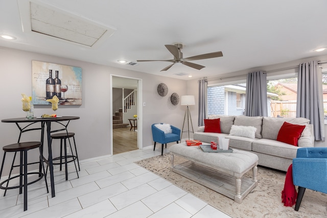 living room with ceiling fan