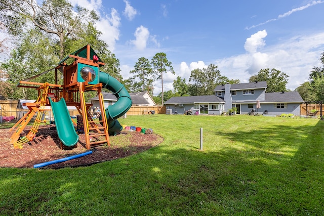 view of jungle gym with a lawn