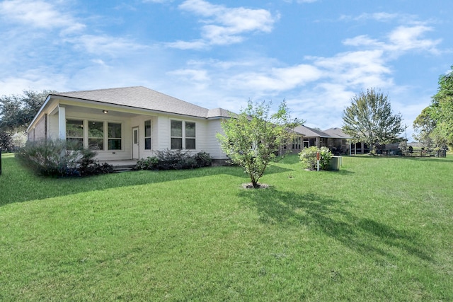 exterior space featuring a front lawn