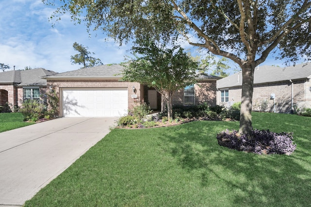 ranch-style home featuring a garage and a front lawn