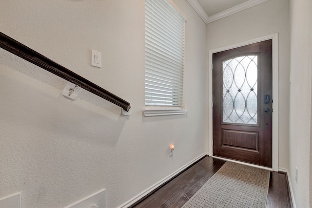 entryway featuring dark hardwood / wood-style flooring and crown molding