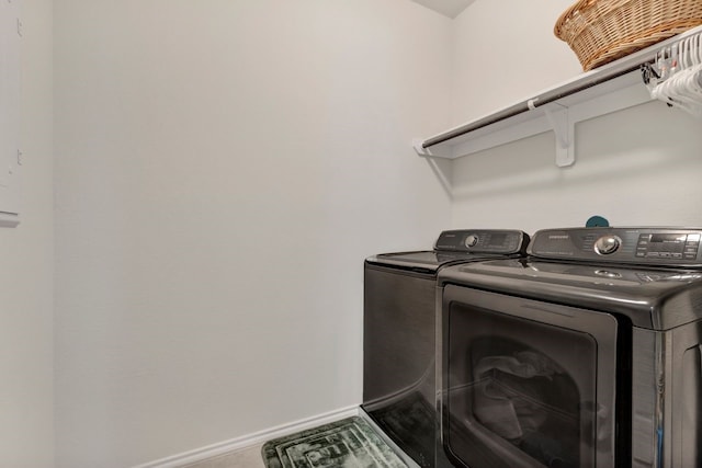 laundry area with separate washer and dryer