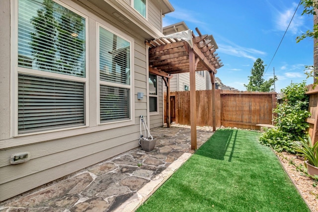 view of yard with a pergola