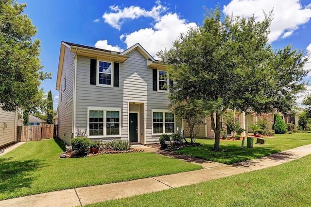 view of front of property featuring a front yard